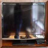 E01. 42” Sharp TV. Model LC-42D62U. - $95 